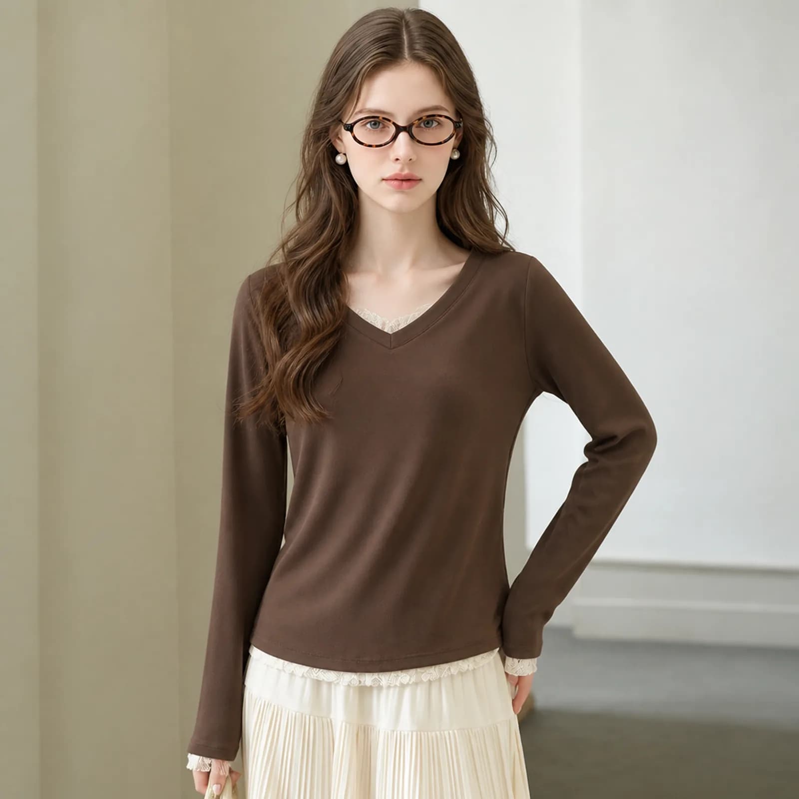 AI clothing photo of a brown V-neck top over a cream lace cami