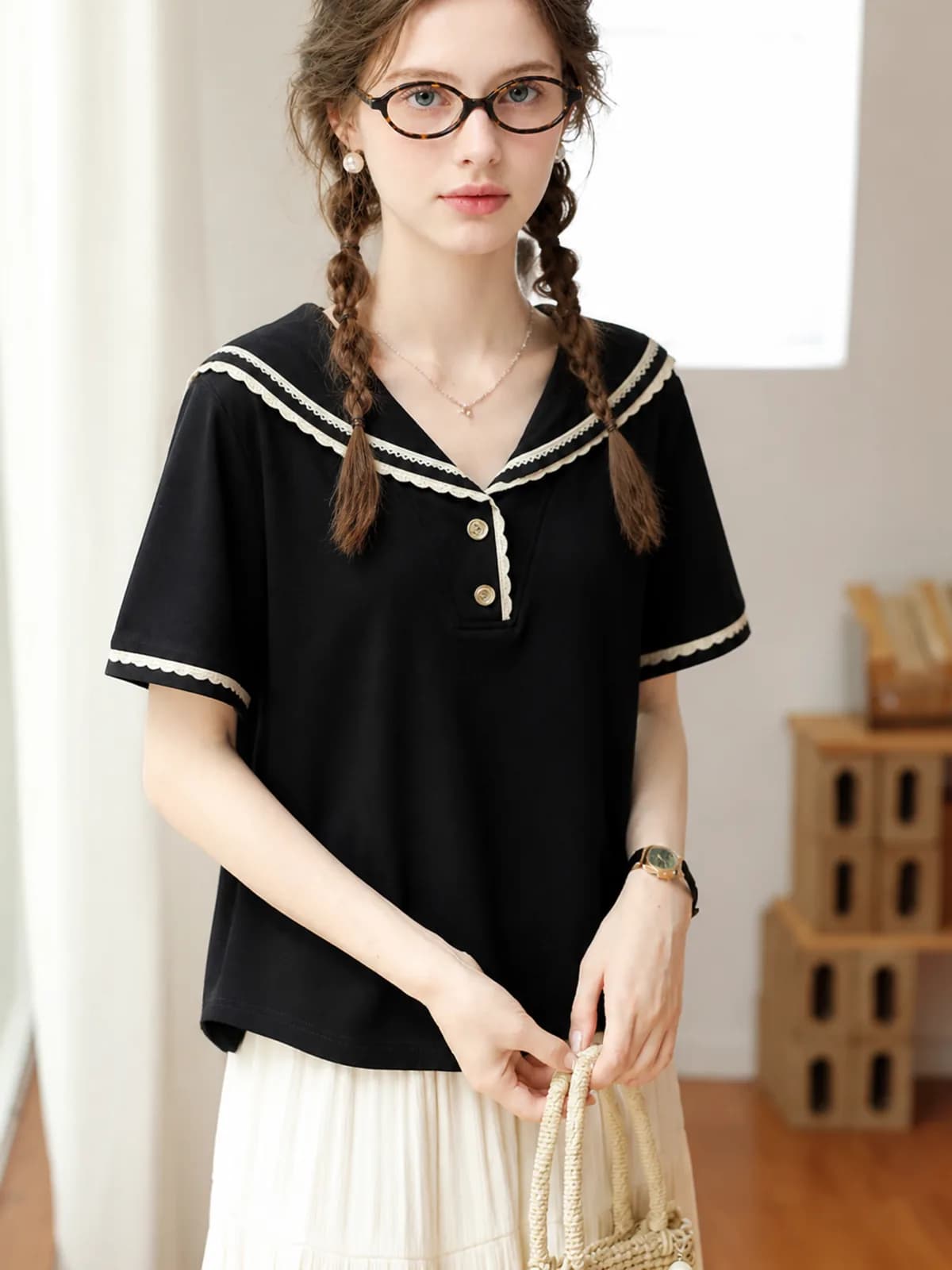 AI photoshoot frame of a black lace-trimmed sailor-collar top indoors