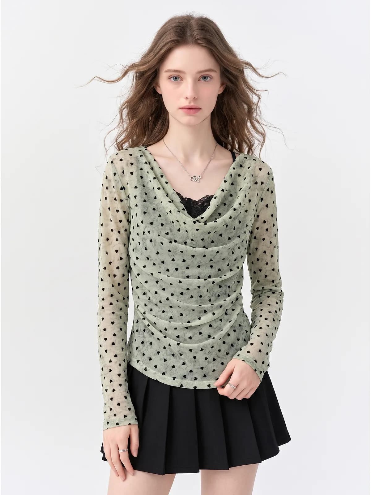 Sage green sheer flocked-heart mesh cowl-neck top on an AI model