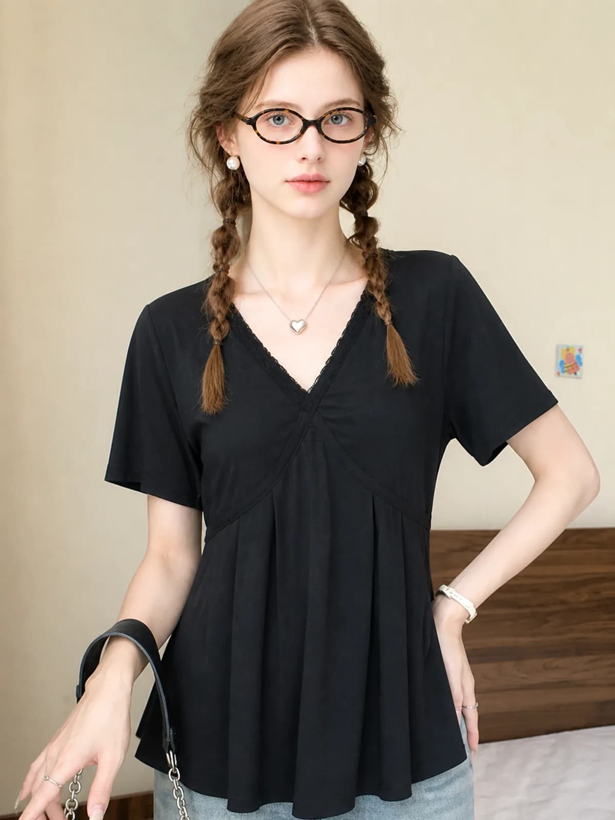 Black draped V-neck top with lace trim on an AI model for an Etsy listing